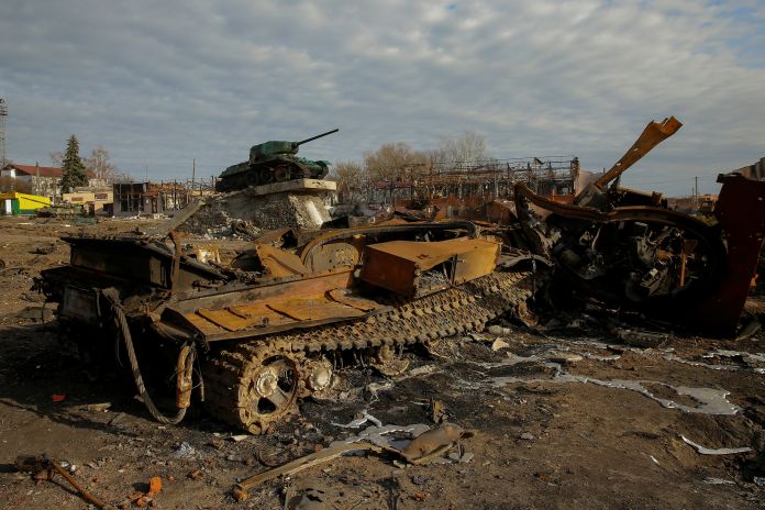 A destroyed Russian tank is seen in Trostianets